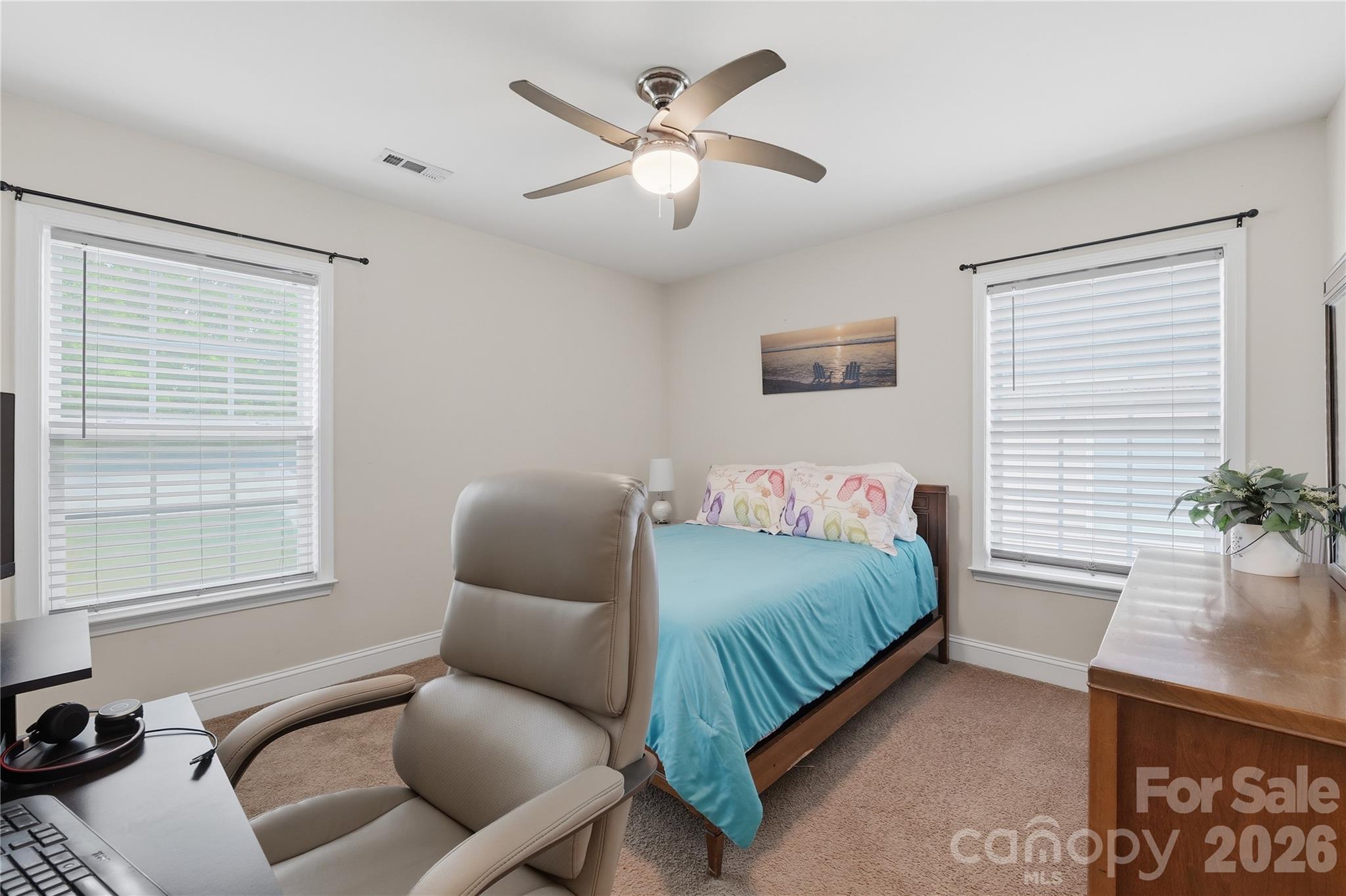 122 Colville Road Mooresville, NC 28117 - Photo 19 of 24 a bedroom with a bed and a couch