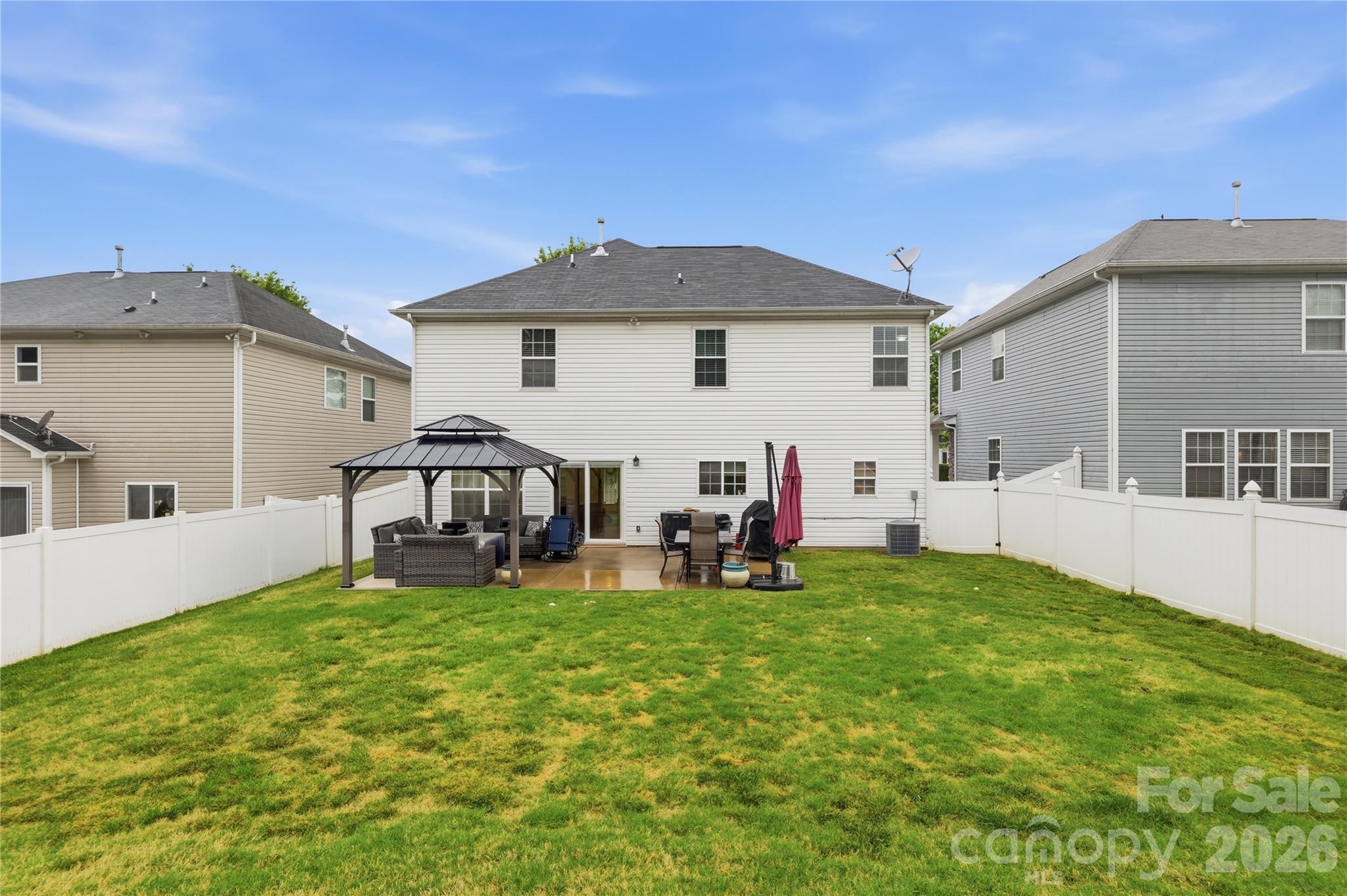 122 Colville Road Mooresville, NC 28117 - Photo 23 of 24 a view of a house with a yard and sitting area