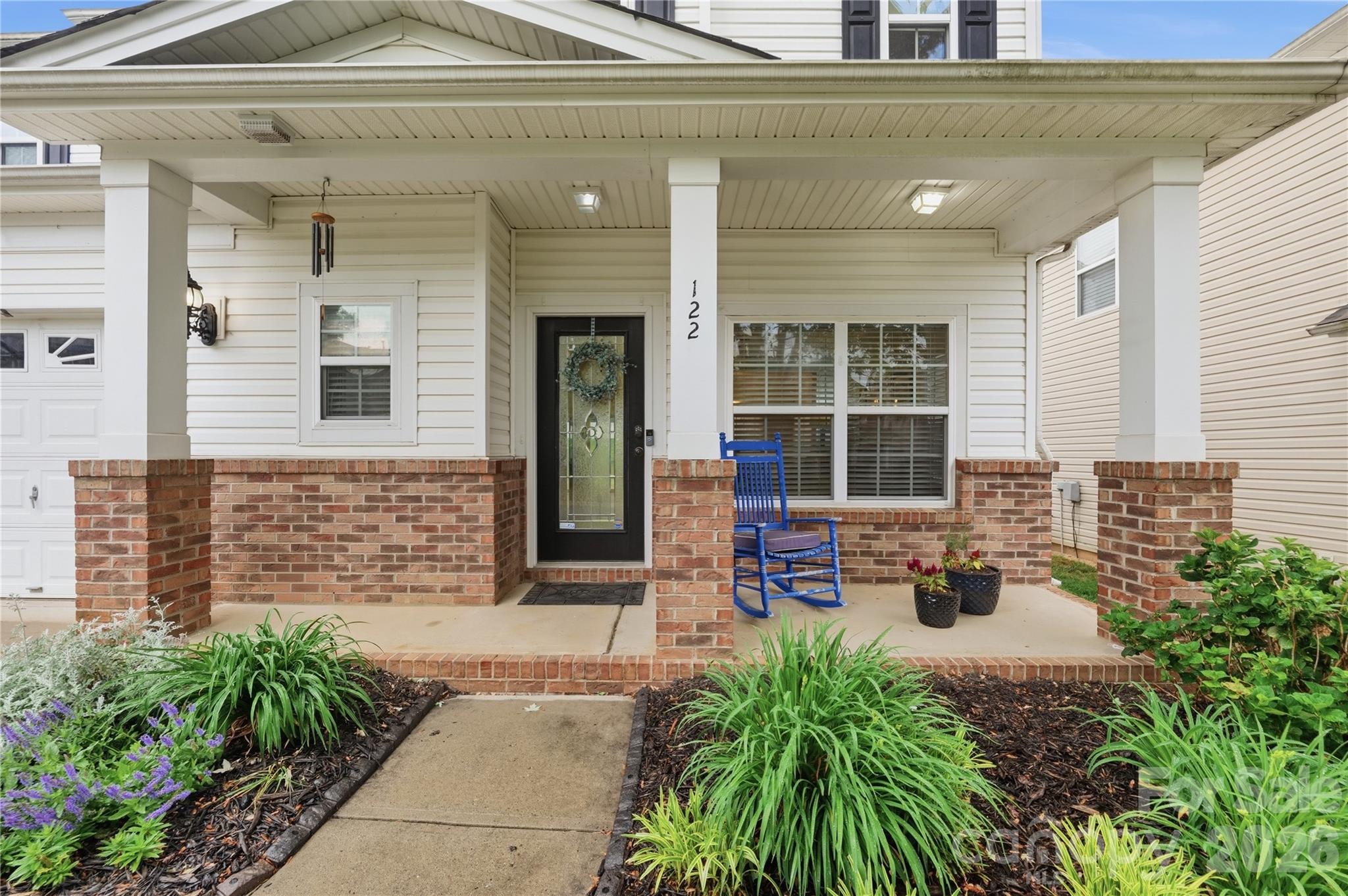 122 Colville Road Mooresville, NC 28117 - Photo 3 of 24 a front view of a house with a large window