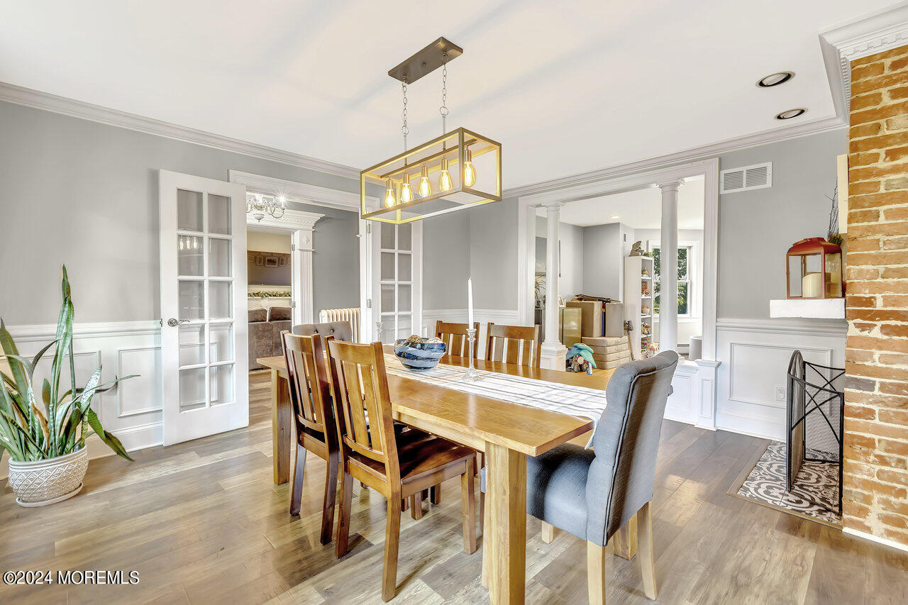 238 County Road 539 Cream Ridge, NJ 08514 - Photo 19 of 32 a view of a dining room with furniture and wooden floor