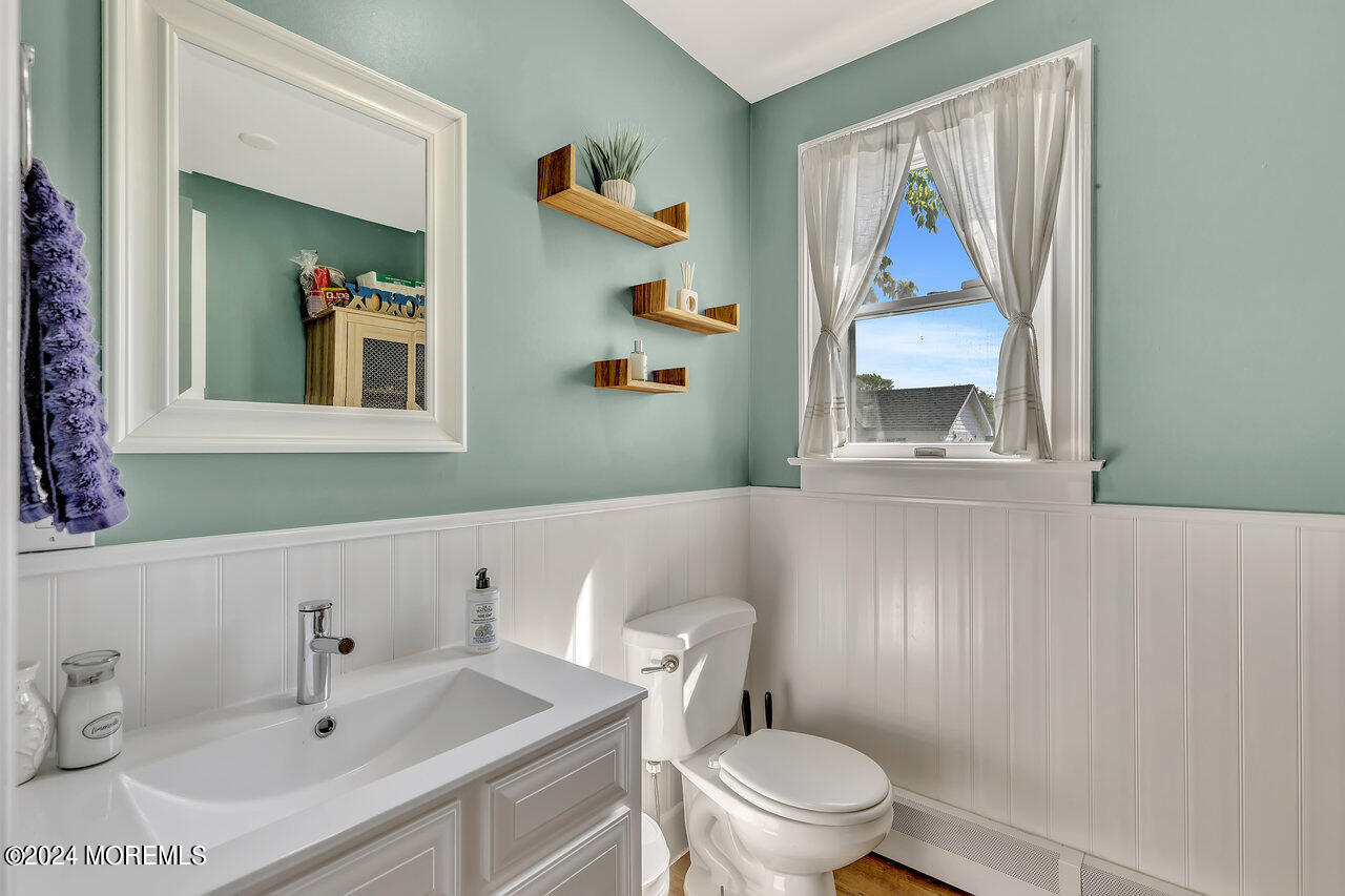 238 County Road 539 Cream Ridge, NJ 08514 - Photo 26 of 32 a bathroom with a sink mirror and toilet
