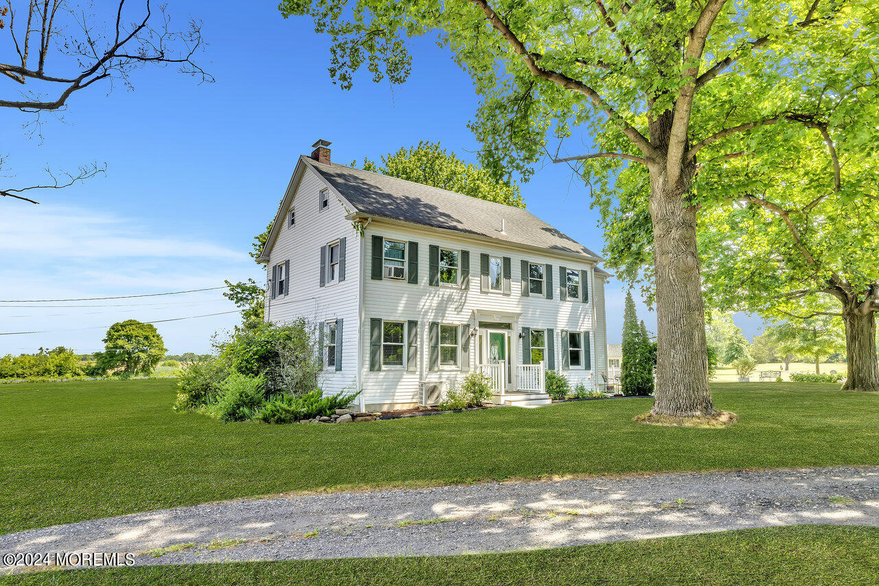 238 County Road 539 Cream Ridge, NJ 08514 - Photo 5 of 32 a front view of a house with a yard