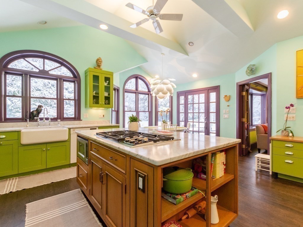 128 Dorset Road Newton, MA 02468 - Photo 12 of 36 a kitchen with a stove a sink dishwasher and a stove with wooden floor