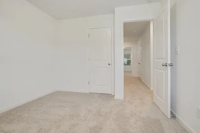 a bathroom with a sink toilet a mirror and shower