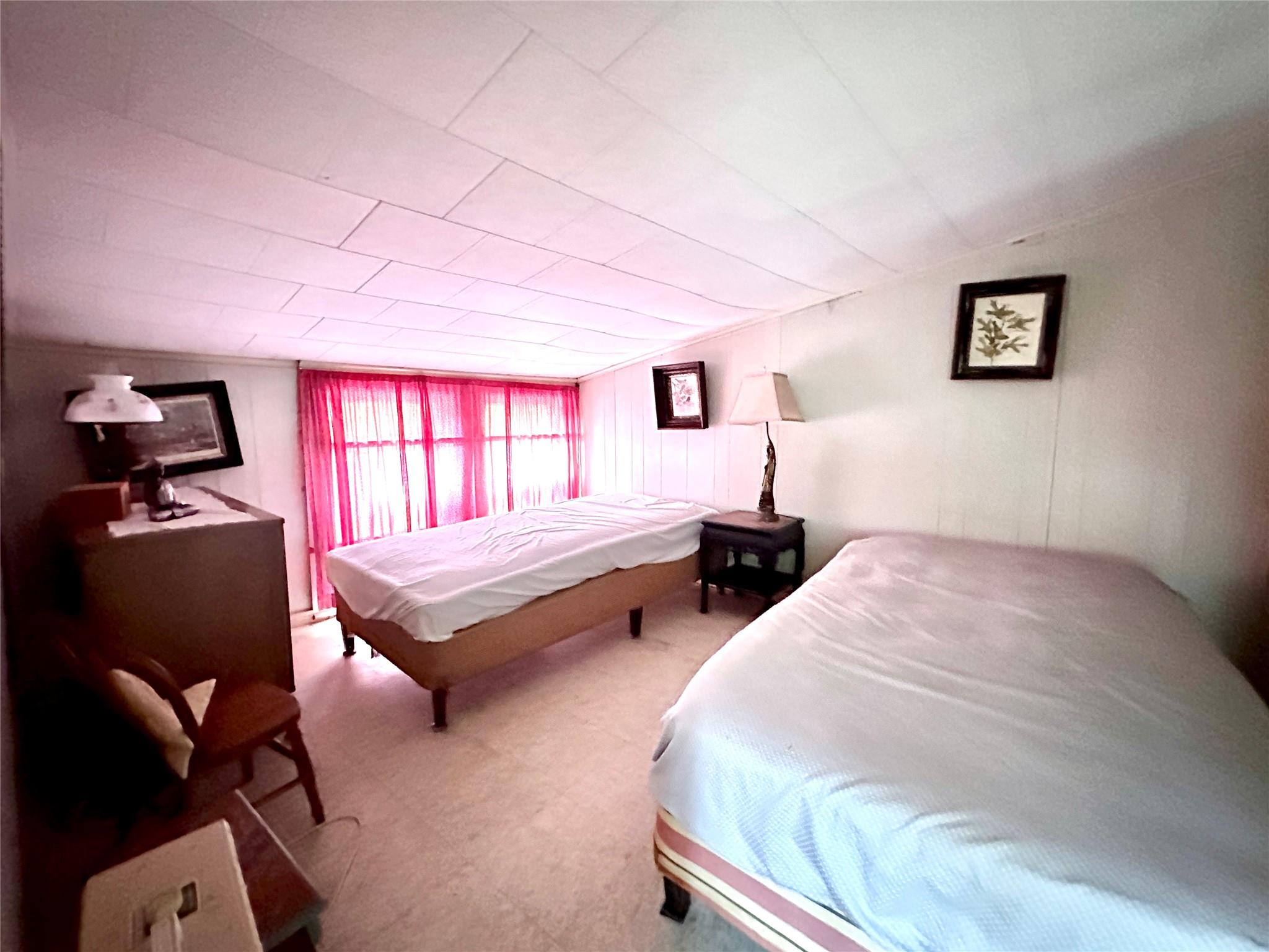 Rye Hill Road Monroe, NY 10950 - Photo 23 of 32 a bedroom with a bed and wooden floor