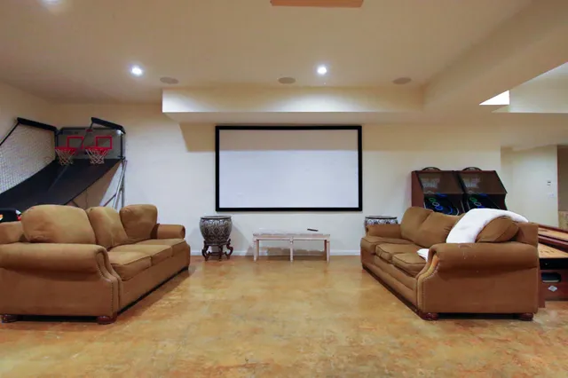 a lobby with furniture and a table