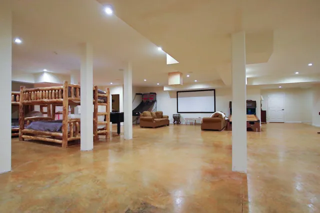 a backyard of a house with outdoor seating