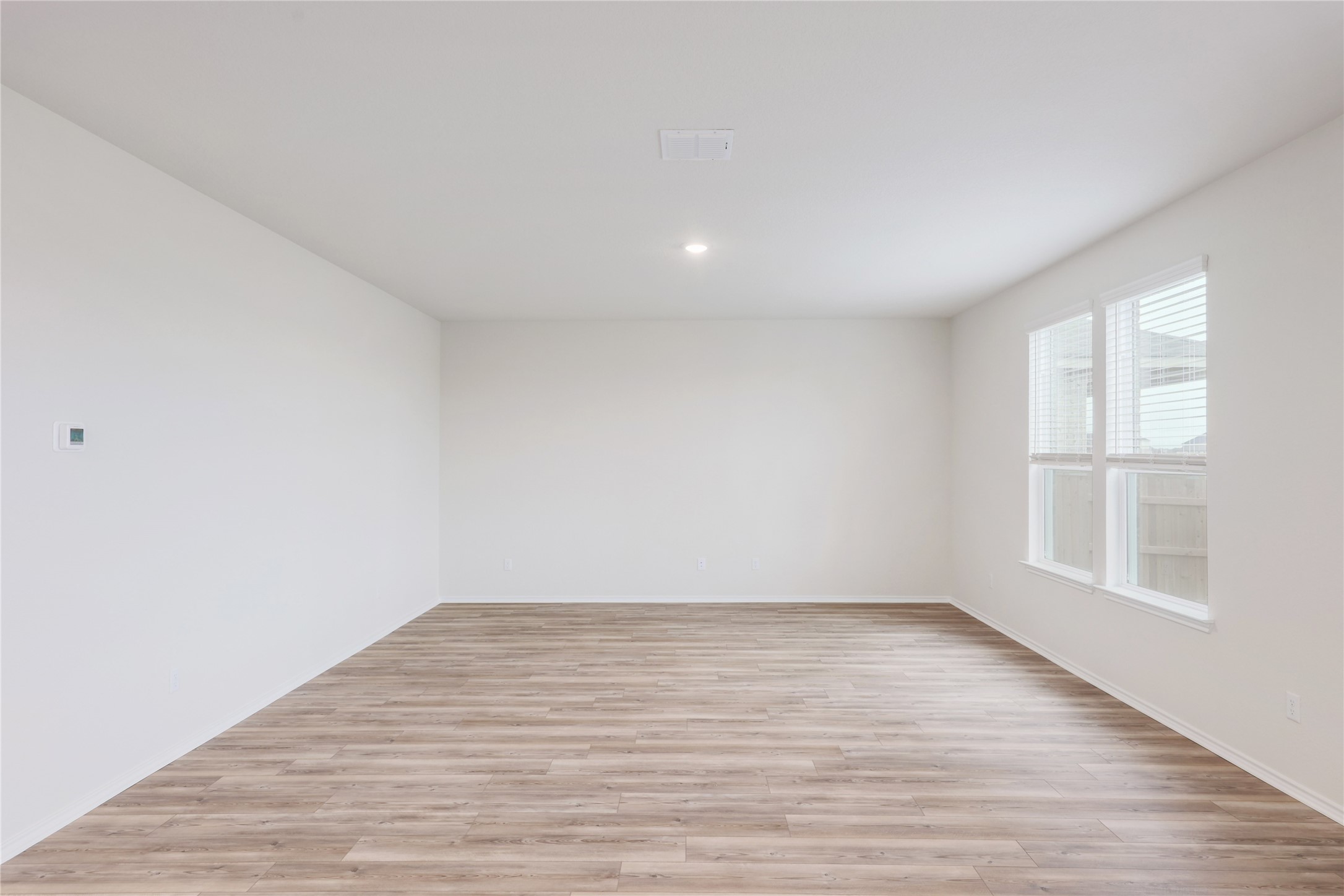 212 Sugar Cane Road Buda, TX 78610 - Photo 9 of 40 Abundant natural light give this home an airy feel.