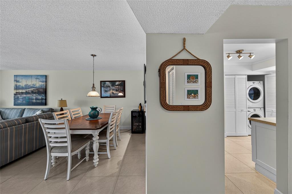 1550 Northwest 80th Avenue, Unit 303 Margate, FL 33063 - Photo 11 of 41 a view of a livingroom with furniture and a window