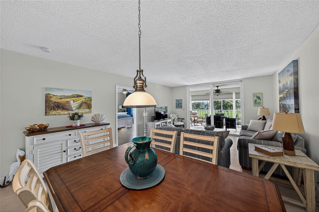 1550 Northwest 80th Avenue, Unit 303 Margate, FL 33063 - Photo 12 of 41 a living room with furniture
