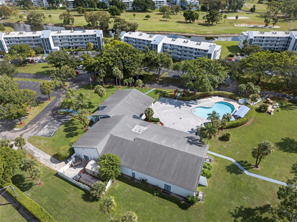 1550 Northwest 80th Avenue, Unit 303 Margate, FL 33063 - Photo 3 of 41 an aerial view of a house with a garden