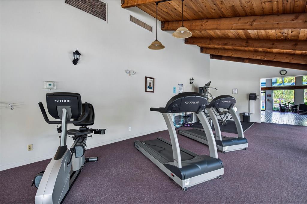 1550 Northwest 80th Avenue, Unit 303 Margate, FL 33063 - Photo 37 of 41 a view of a room with gym equipment