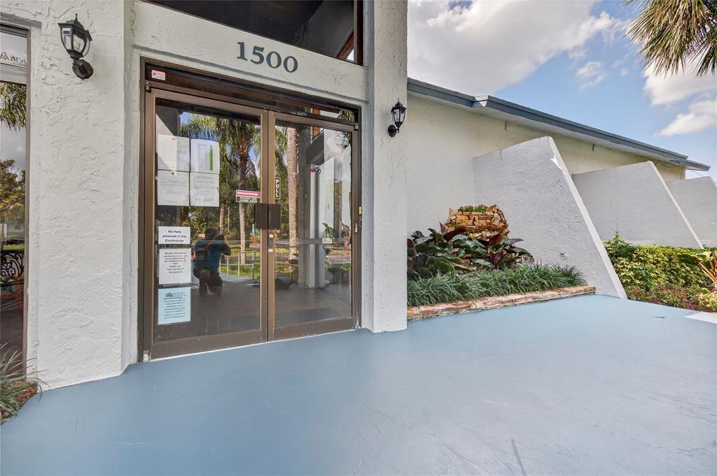 1550 Northwest 80th Avenue, Unit 303 Margate, FL 33063 - Photo 41 of 41 a view of a porch with seating space
