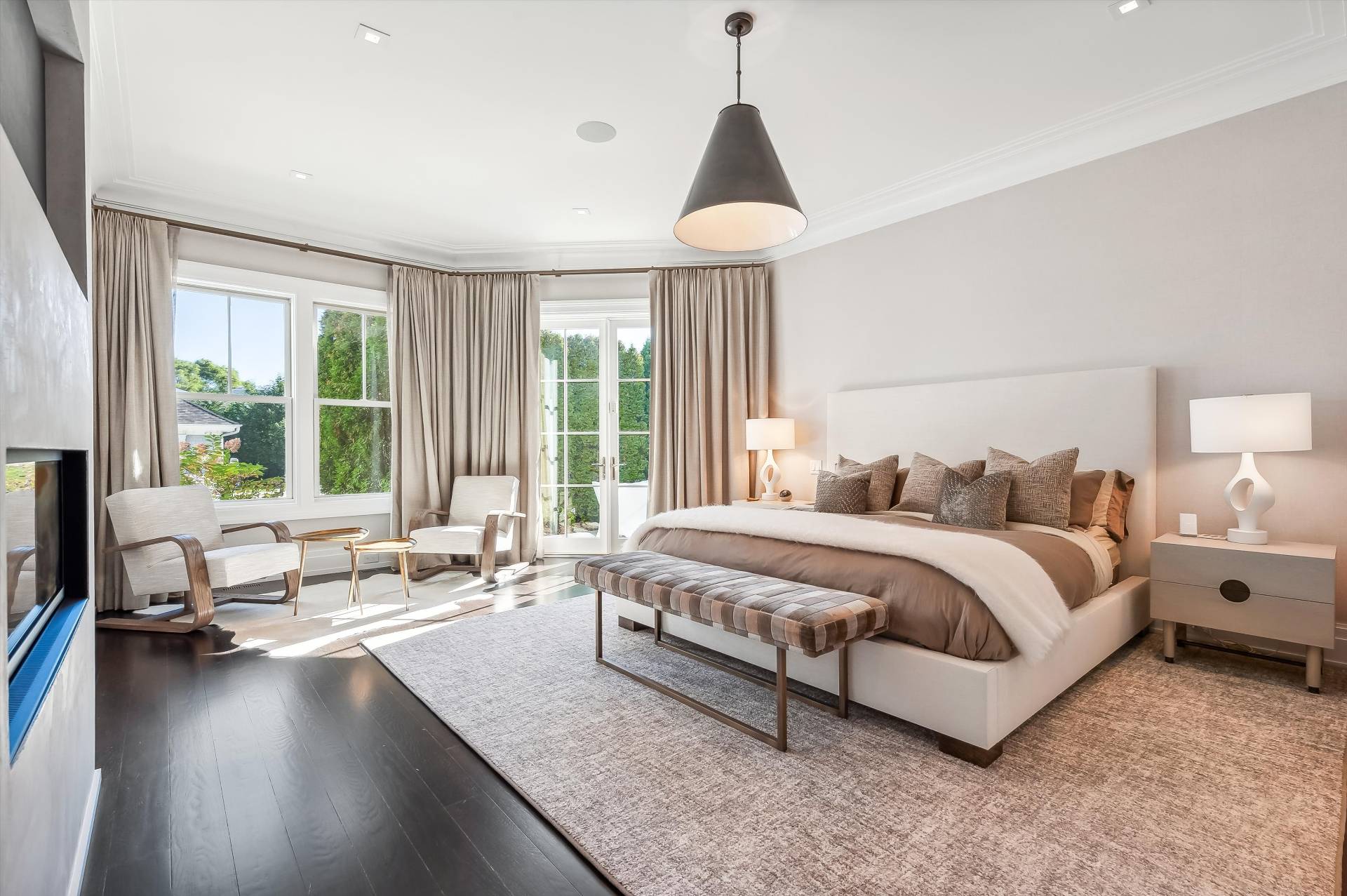 80 Cobb Road Water Mill, NY 11976 - Photo 14 of 35 a spacious bedroom with a bed and large windows