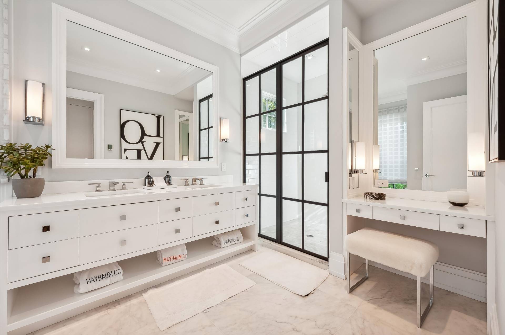 80 Cobb Road Water Mill, NY 11976 - Photo 15 of 35 a spacious bathroom with a double vanity sink a mirror a bathtub and shower