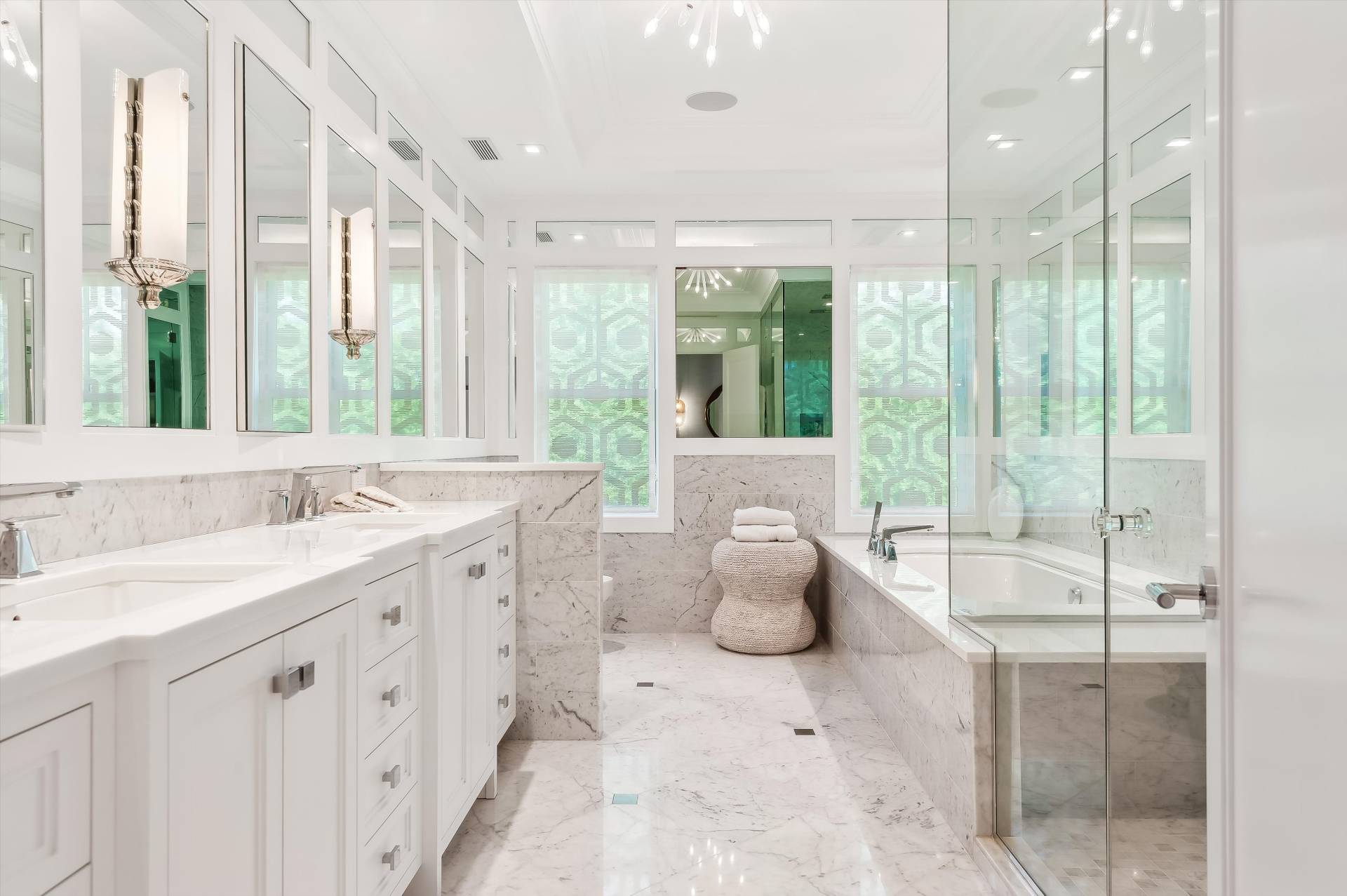 80 Cobb Road Water Mill, NY 11976 - Photo 17 of 35 a spacious bathroom with a double vanity sink and a large mirror