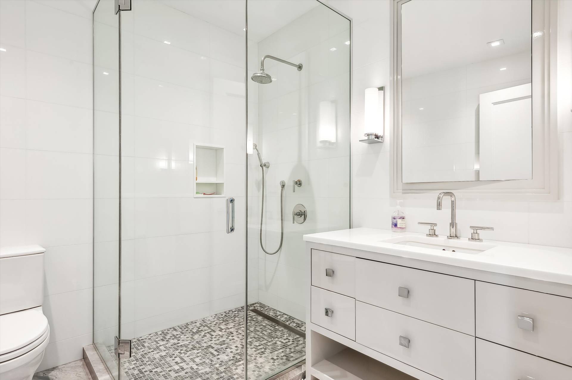 80 Cobb Road Water Mill, NY 11976 - Photo 21 of 35 a spacious bathroom with a shower sink and toilet
