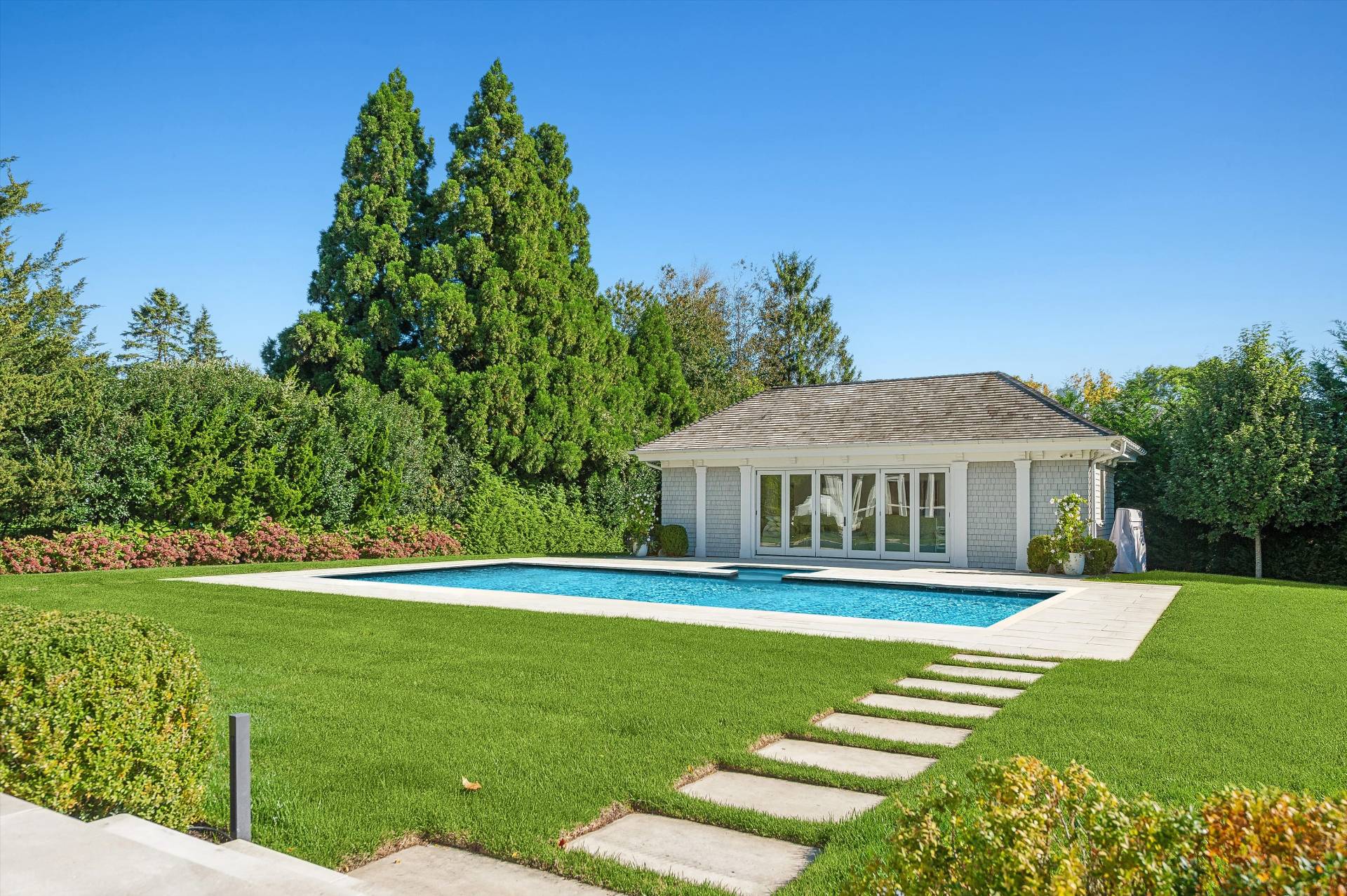 80 Cobb Road Water Mill, NY 11976 - Photo 33 of 35 a front view of a house with a yard