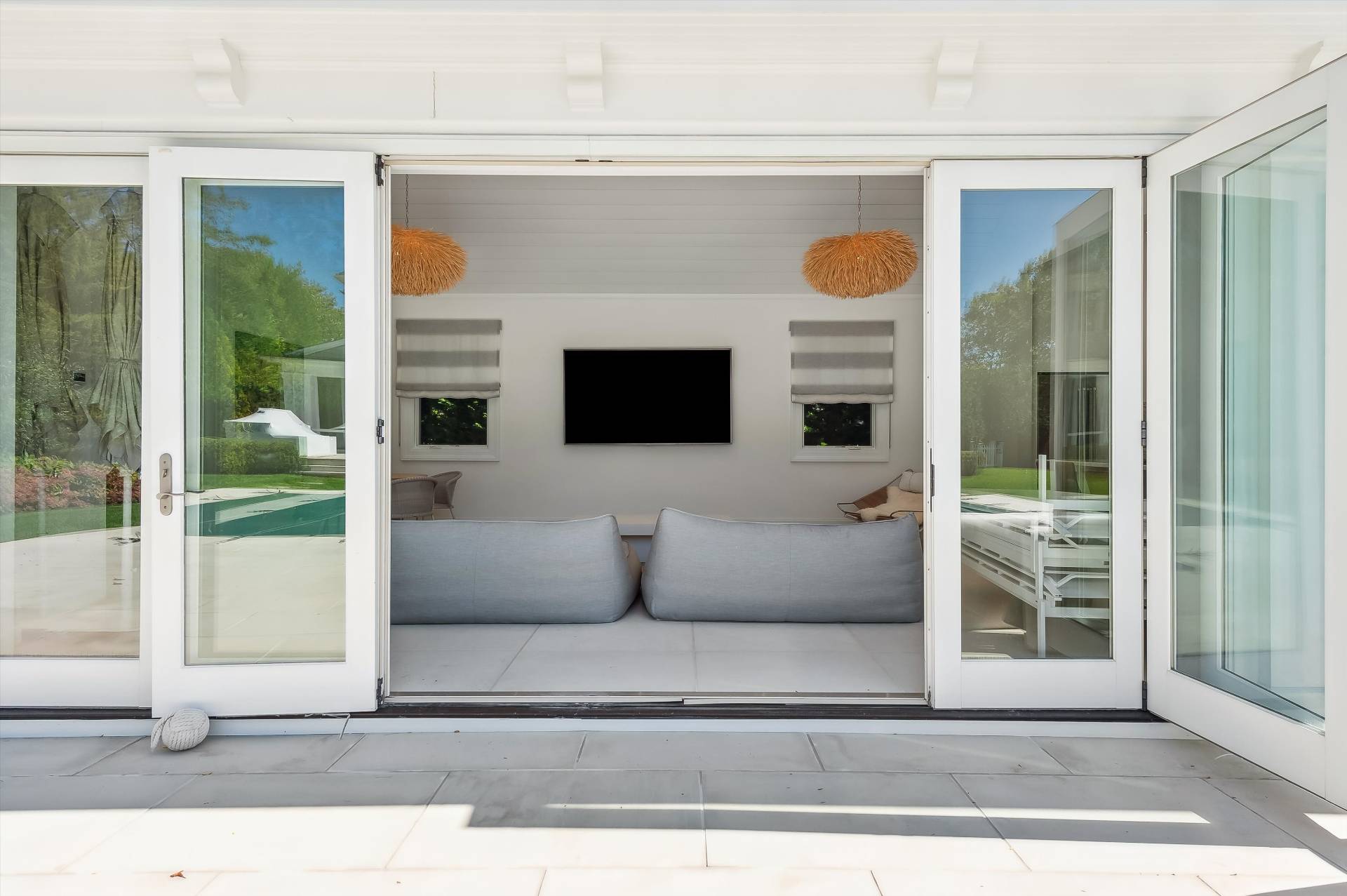80 Cobb Road Water Mill, NY 11976 - Photo 34 of 35 a living room with furniture and a fireplace
