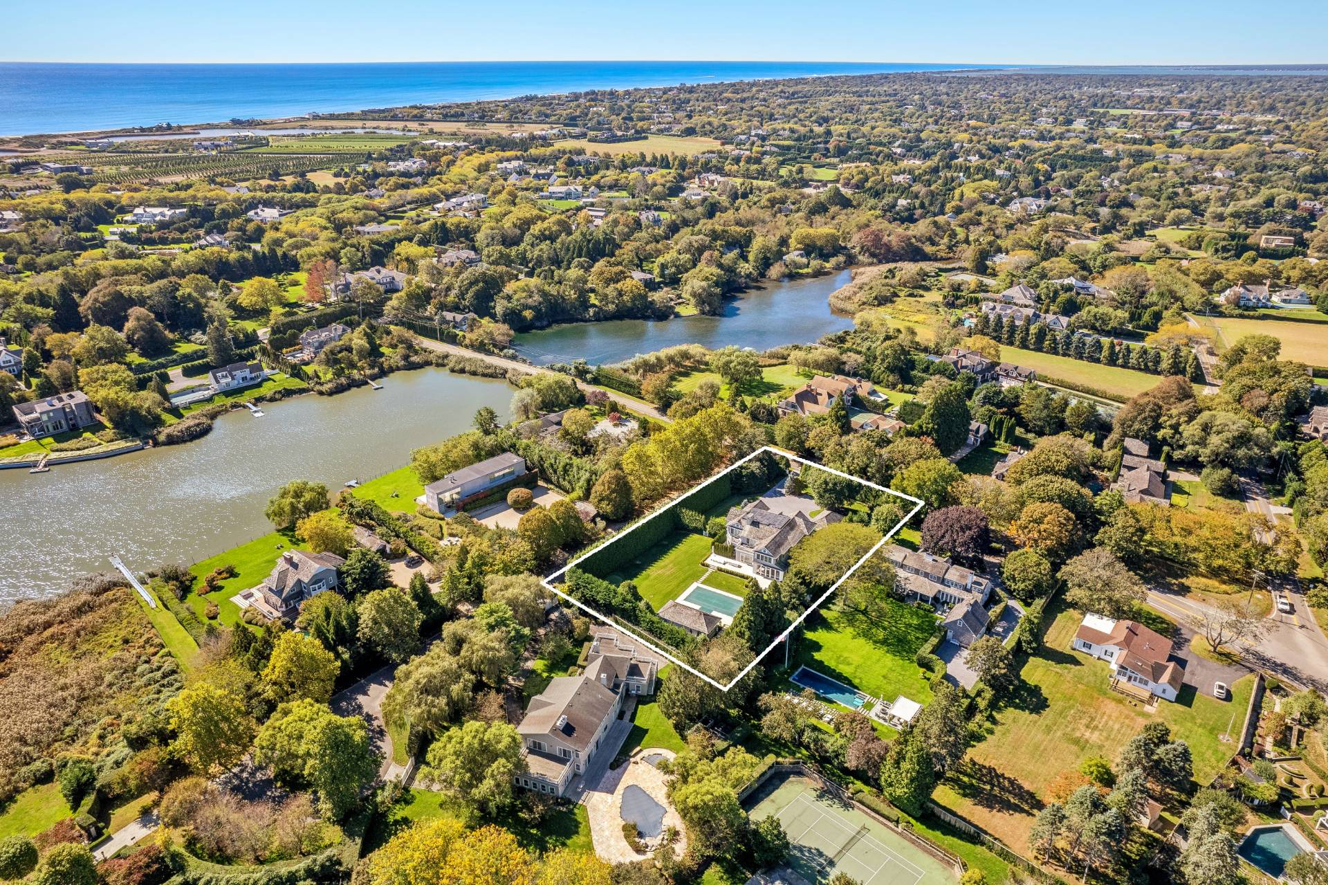 80 Cobb Road Water Mill, NY 11976 - Photo 4 of 35 an aerial view of residential houses with outdoor space
