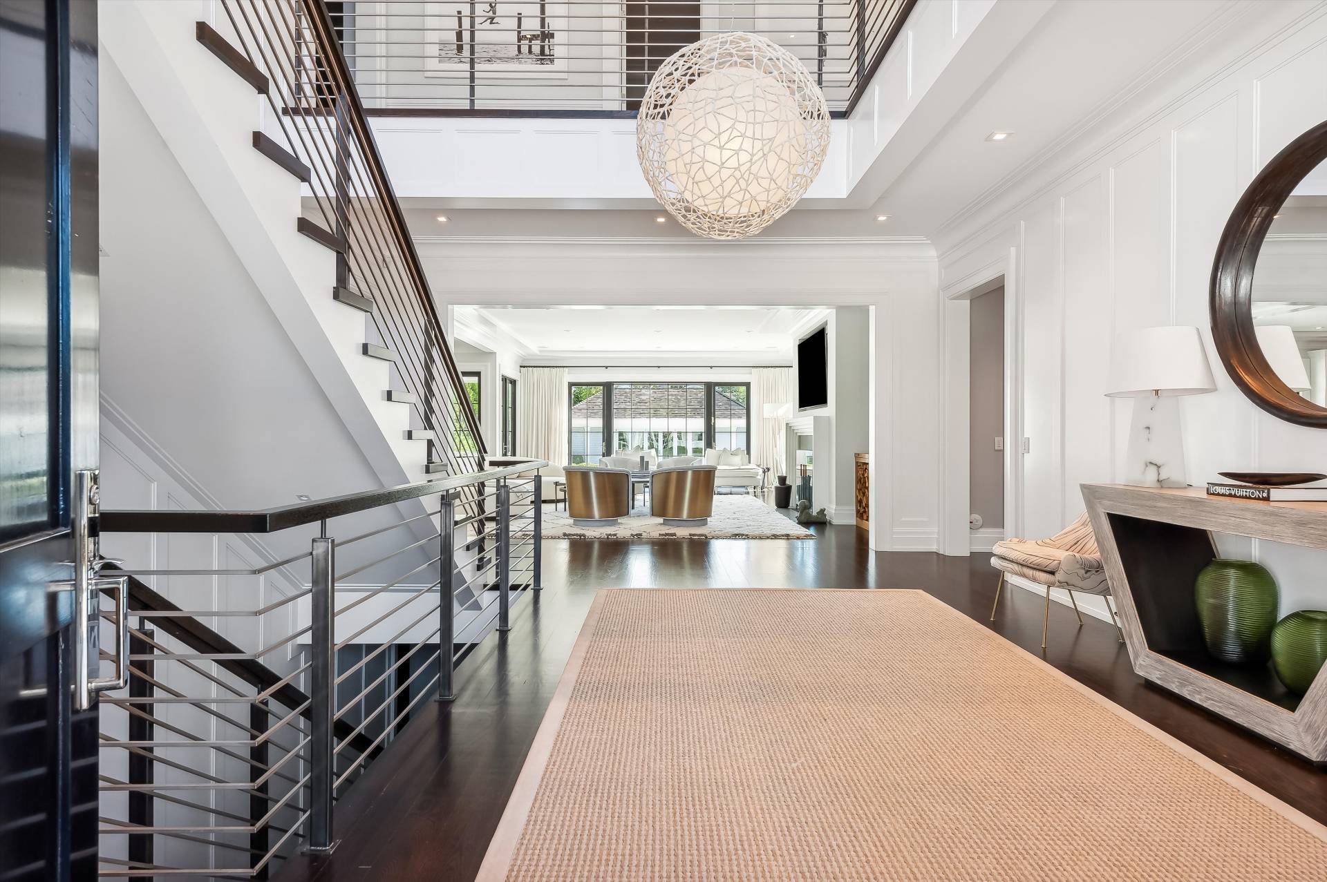80 Cobb Road Water Mill, NY 11976 - Photo 5 of 35 a view of a livingroom with furniture staircase and kitchen view