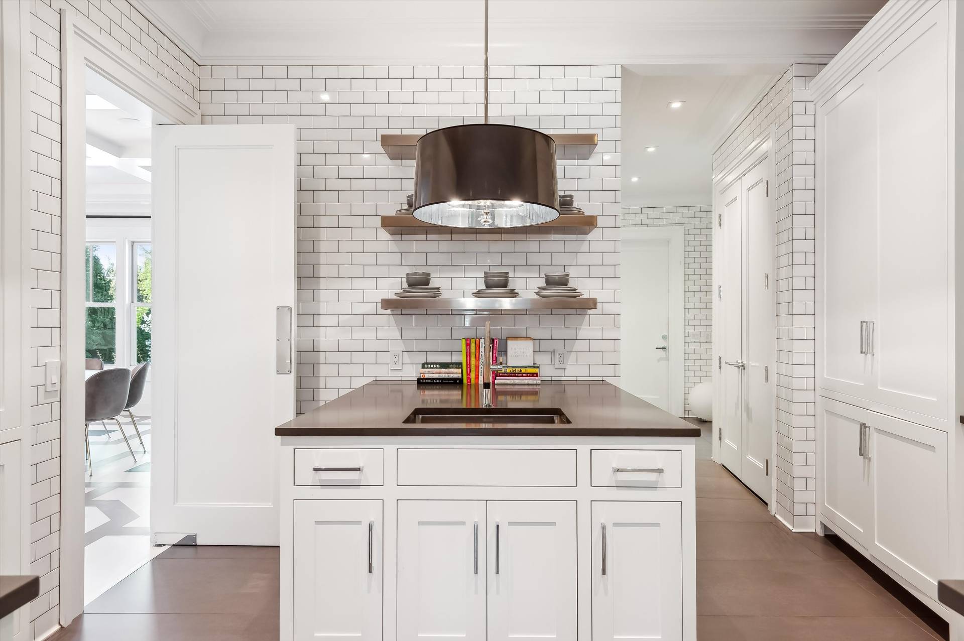 80 Cobb Road Water Mill, NY 11976 - Photo 10 of 35 a kitchen with a sink and cabinets