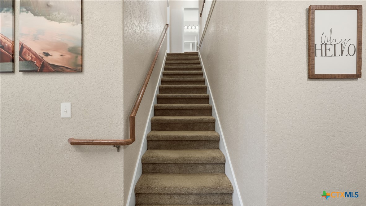 716 Hollow Ridge Schertz, TX 78108 - Photo 31 of 47 Stairs leading to the spacious gameroom and 3 secondary bedrooms