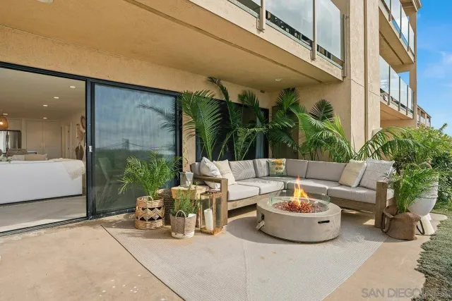 a outdoor space with patio furniture and potted plants