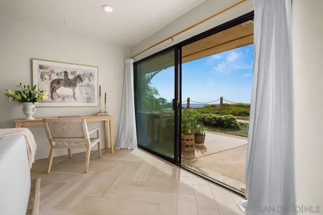 a view of a room with a large window