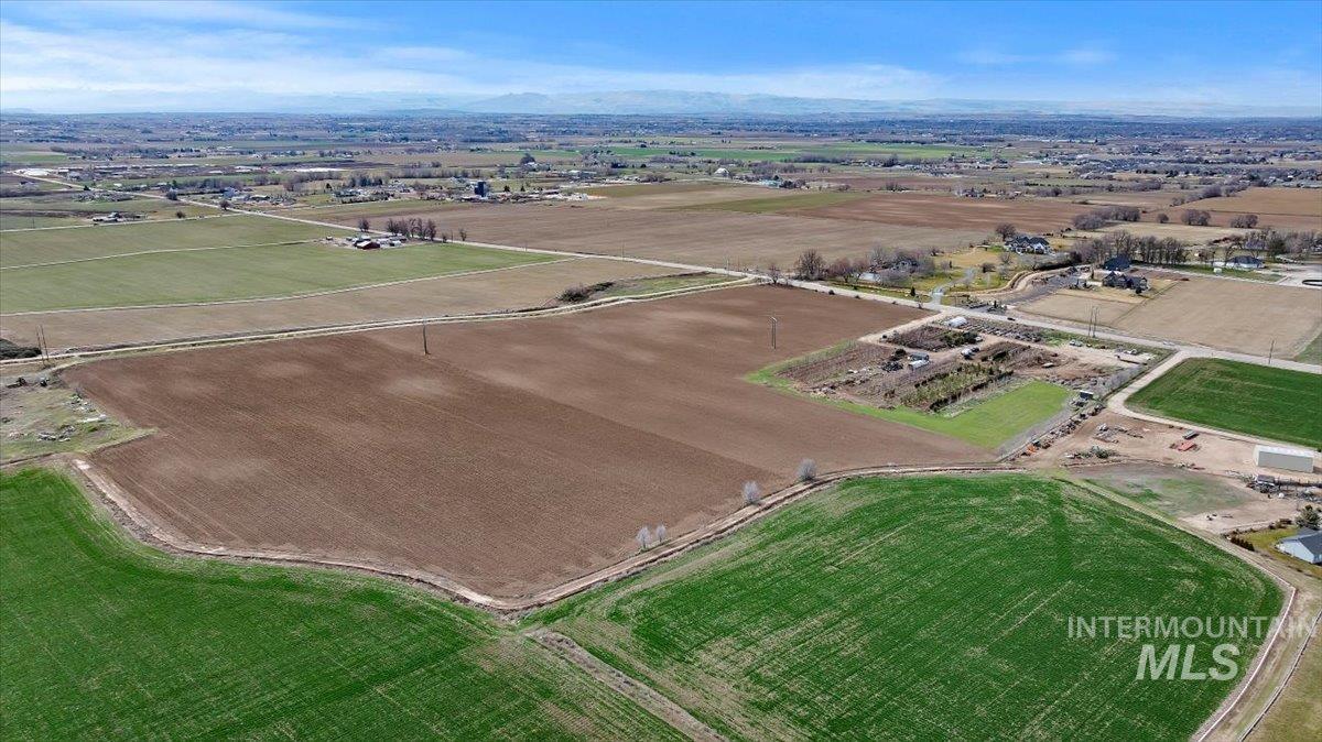 3850 South Black Cat Road Meridian, ID 83642 - Photo 5 of 7 Aerial view of sparsely populated area featuring farmland