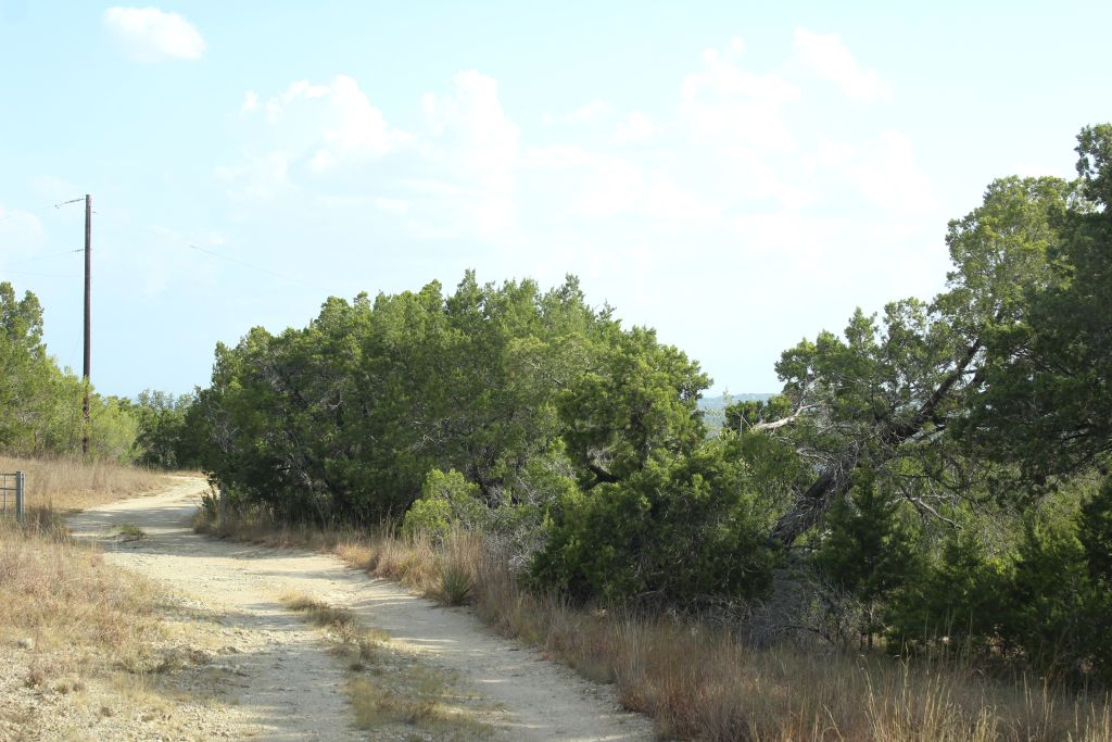 28808 Rim Rock Road Marble Falls, TX 78654 - Photo 6 of 15 Lower level roadway to Lots at power pole