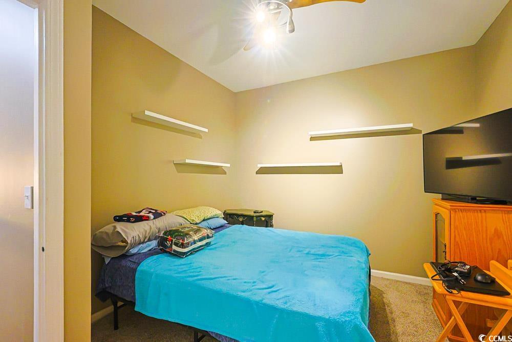 105 Rocko Drive Myrtle Beach, SC 29579 - Photo 20 of 38 Bedroom featuring light colored carpet and ceiling fan