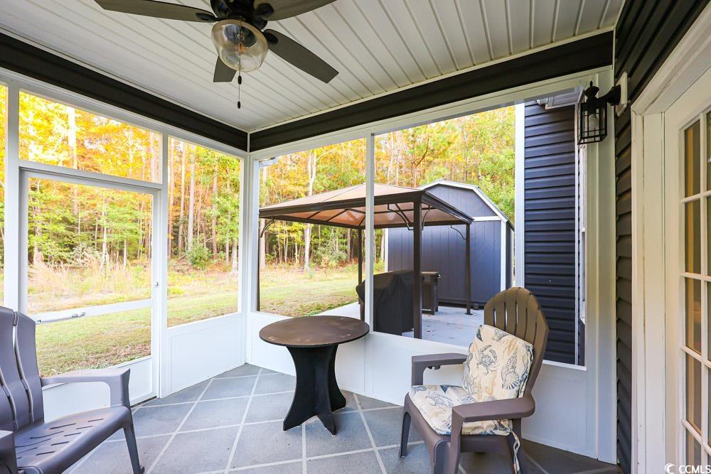 105 Rocko Drive Myrtle Beach, SC 29579 - Photo 35 of 38 Sunroom / solarium featuring ceiling fan