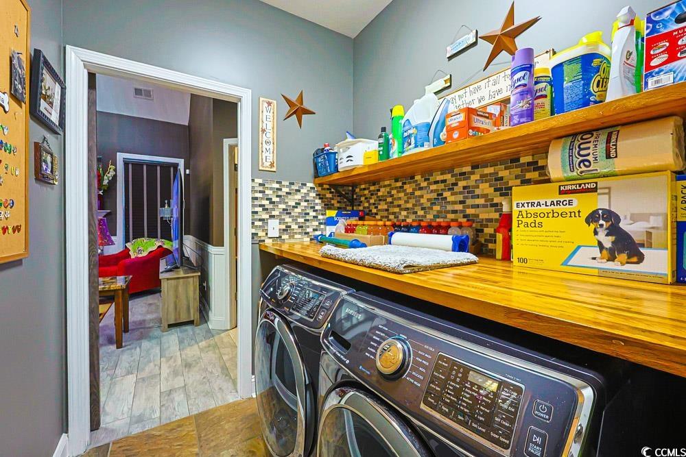105 Rocko Drive Myrtle Beach, SC 29579 - Photo 38 of 38 Laundry area with separate washer and dryer and light wood-type flooring