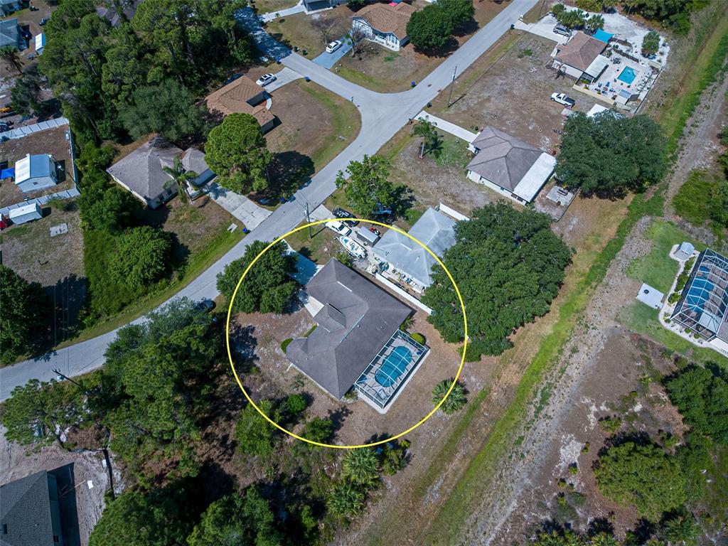7146 Sablon Road North Port, FL 34291 - Photo 1 of 1 an aerial view of a house with a garden