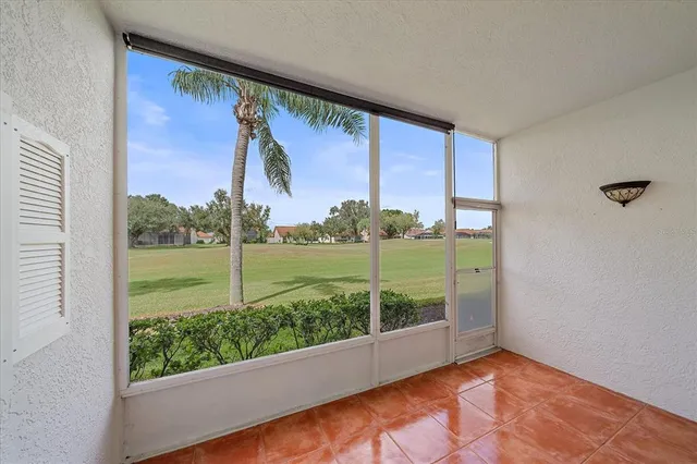 a view of a room that has a large window