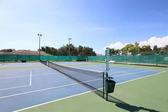 a view of yard with swimming pool and outdoor seating
