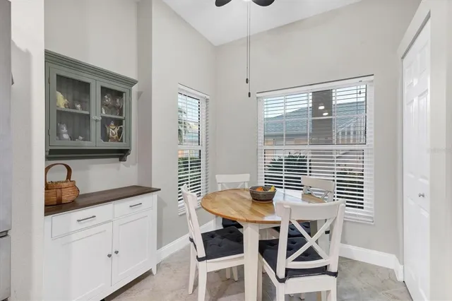 a view of a dining room and chairs in a room