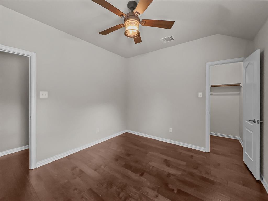 3205 Ridgeway Drive McKinney, TX 75071 - Photo 15 of 27 an empty room with fan and a ceiling fan