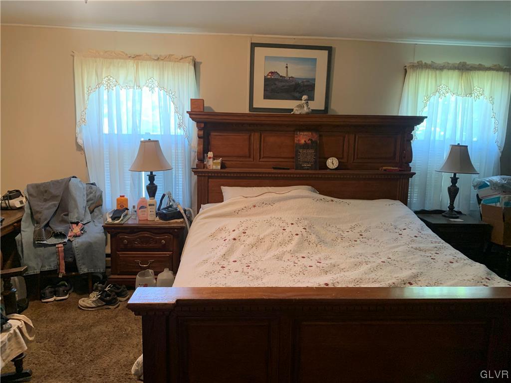542 Norman Road Nazareth, PA 18064 - Photo 15 of 23 a bedroom with a bed and window