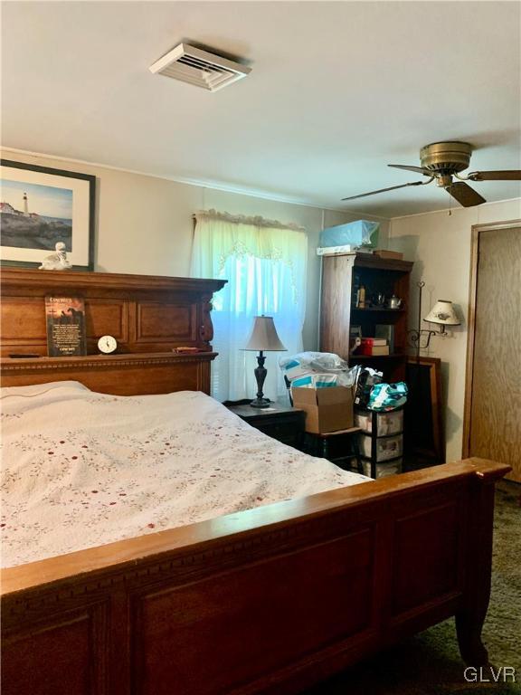 542 Norman Road Nazareth, PA 18064 - Photo 16 of 23 a bed room with a bed and a mirror