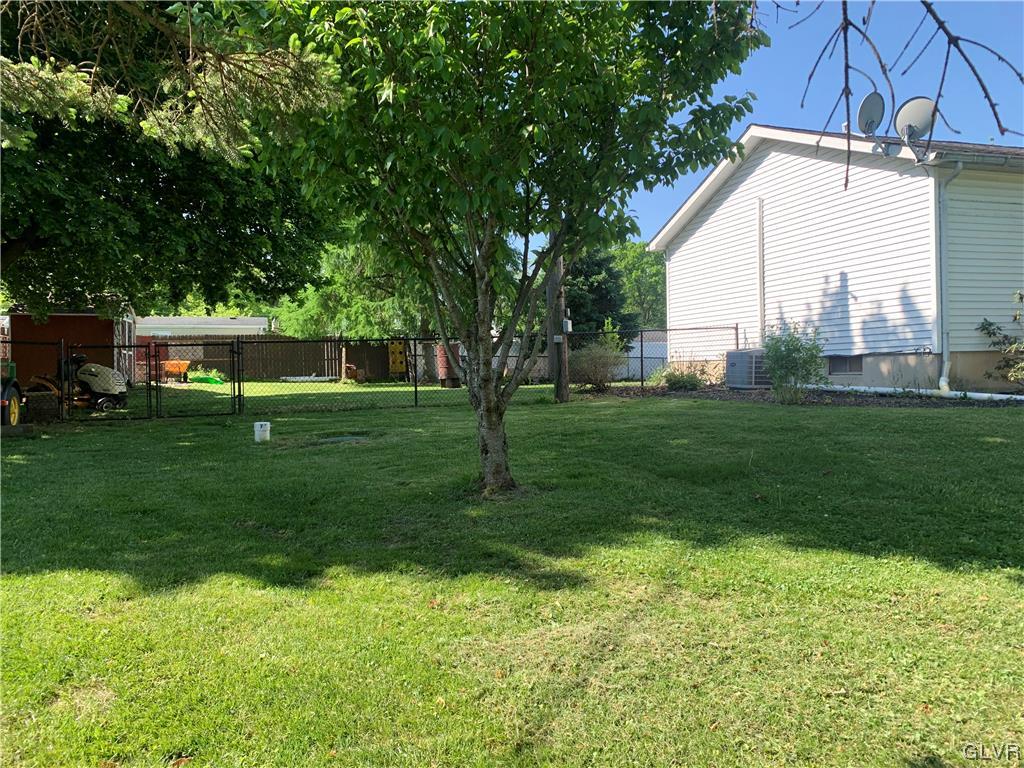 542 Norman Road Nazareth, PA 18064 - Photo 3 of 23 a house view with a garden space