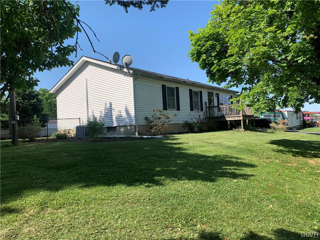 542 Norman Road Nazareth, PA 18064 - Photo 4 of 23 a front view of house with yard and green space