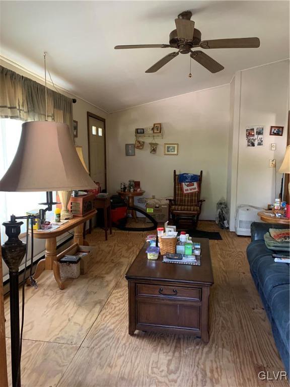 542 Norman Road Nazareth, PA 18064 - Photo 6 of 23 a living room with furniture and a flat screen tv