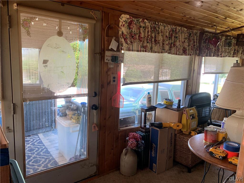 542 Norman Road Nazareth, PA 18064 - Photo 7 of 23 a view of living room with furniture and a large window