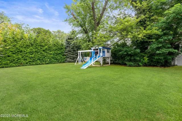 a view of a house with a big yard