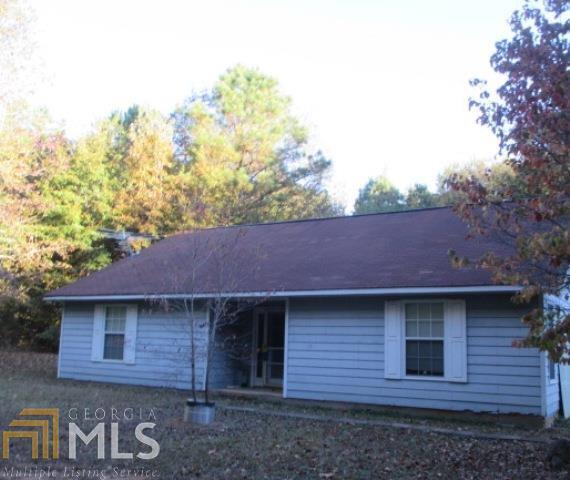 276 Issac Head Road Jackson, GA 30233 - Photo 1 of 1 a front view of a house with garden