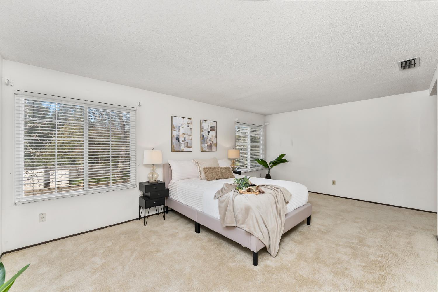 3126 Oxford Road Cameron Park, CA 95682 - Photo 19 of 45 a bed room with a bed and a chair