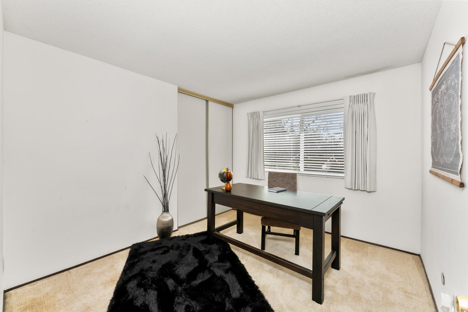 3126 Oxford Road Cameron Park, CA 95682 - Photo 25 of 45 a bedroom with a bed and a window