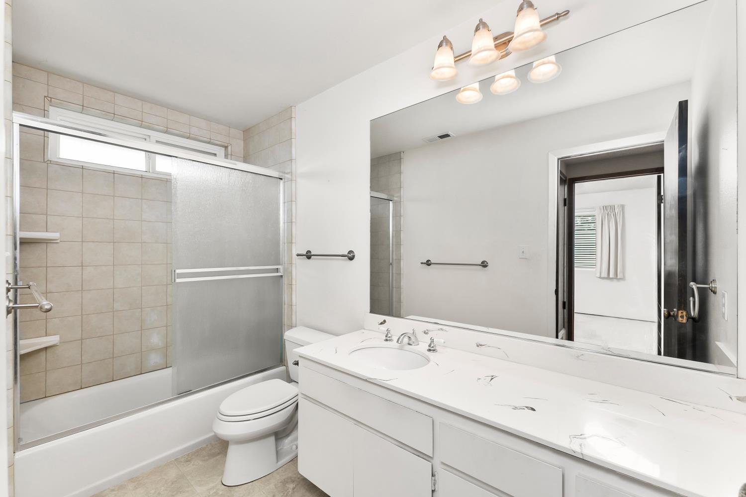 3126 Oxford Road Cameron Park, CA 95682 - Photo 27 of 45 a bathroom with a sink a toilet and shower